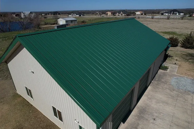 Green metal roof on a shop building on acreage outside Dallas–Fort Worth
